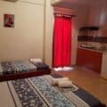 Thumbnail of http://Spavaći%20deo%20studija%20u%20Vili%20Thomas%20u%20Nei%20Poriju%20sa%20više%20kreveta%20i%20kuhinjskim%20delom
